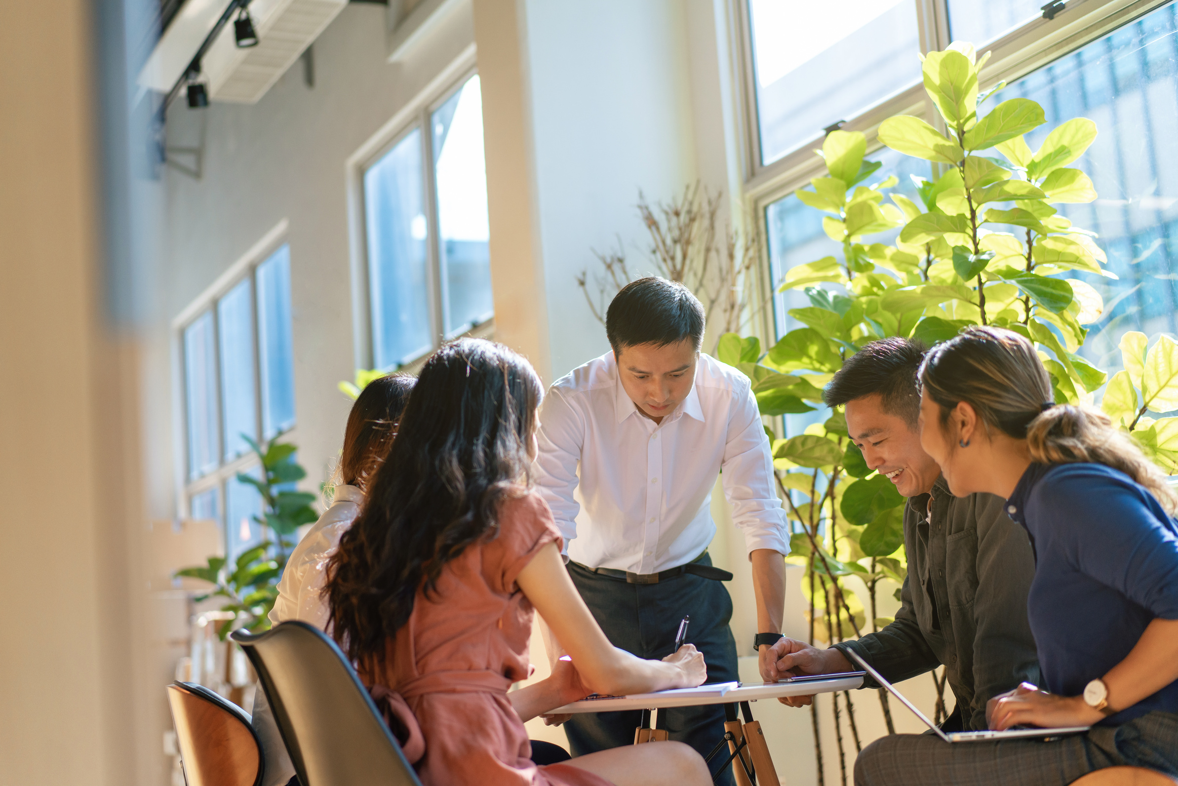 Young asian business and corporate team meeting